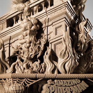 May include: A detailed sculpture of a building engulfed in flames, with the words "The Amazing Spider-Man" carved into the base. The sculpture features a pumpkin and spiderweb design.