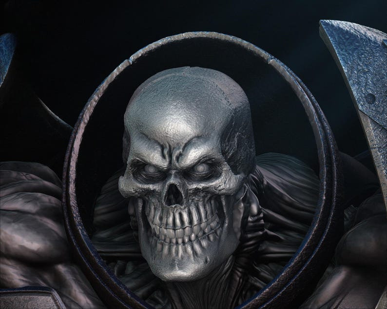 May include: A detailed, close-up image of a metallic skull with glowing white eyes. The skull is framed by a dark, circular structure and set against a dark background. The image has a gothic or fantasy theme.