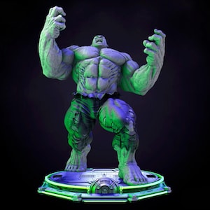 May include: A detailed statue of the Hulk, a muscular green figure, stands on a circular platform. The figure is in a dynamic pose with arms raised, showcasing ripped muscles. The base has a futuristic design with neon green and blue lighting.