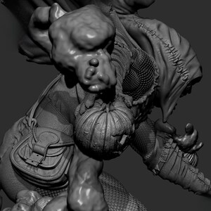 May include: A grayscale sculpture of a creature with a pumpkin, a satchel, and a hooded cloak. The creature has a grotesque face and a textured, scaly appearance. The pumpkin is carved with a jack-o'-lantern face.
