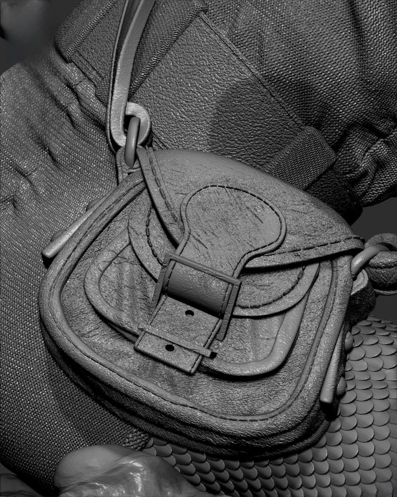 May include: A small, textured leather satchel with a flap closure and buckle. The bag has a shoulder strap and is attached to a textured fabric. The overall design is detailed and appears to be vintage or rustic.