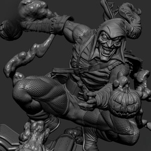 May include: A grayscale sculpture of a comic book villain in a dynamic pose. The figure wears a hooded costume with a menacing grin, holding a pumpkin bomb and a smoke-like cloud. The sculpture has intricate details.