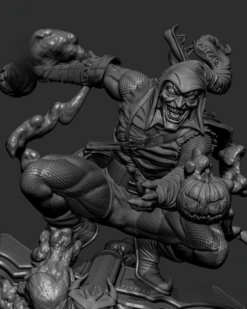 May include: A grayscale sculpture of a comic book villain in a dynamic pose. The figure wears a hooded costume with a menacing grin, holding a pumpkin bomb and a smoke-like cloud. The sculpture has intricate details.