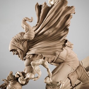 May include: A detailed sculpture of a character in a dynamic pose, featuring a hooded cloak and textured armor. The figure is rendered in shades of brown, with intricate details on the costume and a menacing expression.