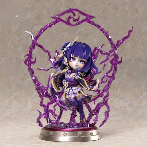 May include: A detailed figurine of a character with purple hair and attire, standing on a decorative base. The figure is surrounded by a translucent purple energy effect. The base is silver with decorative accents. The character has a determined expression.