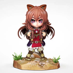 Puede incluir: Figura detallada de un personaje con cabello castaño y orejas de animal, vistiendo un vestido rojo y morado con una parte superior marrón. La figura está sobre una pequeña base texturizada con detalles de hierba verde. El personaje tiene ojos grandes y rosados.