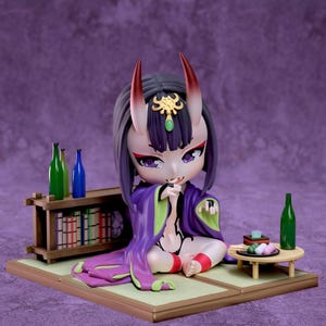 May include: A detailed figurine of a seated anime-style character with purple hair, red horns, and a purple and green kimono. The figure is on a platform with miniature furniture, including a small table and a bookshelf, with bottles and food.