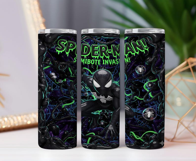 May include: Three stainless steel tumblers with a Spider-Man theme. The design features the text "Spider-Man! Symbiote Invasion!" in green, a black and white Spider-Man figure, and a dark background with green and purple accents.