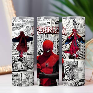 May include: A set of three ceramic mugs with a speckled, matte finish in cream, light grey, and dark grey. Each mug has a simple, minimalist design, ideal for coffee or tea.