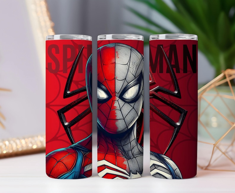 May include: A red and black Spider-Man themed tumbler. The tumbler features the Spider-Man character's face split down the middle, with the words "SPIDER MAN" on the sides. The background includes a black spider web design.