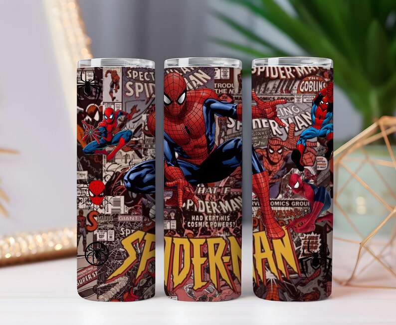 May include: Three stainless steel tumblers with a Spider-Man comic book design. The tumblers display Spider-Man illustrations, comic panels, and text. The colour scheme includes red, blue, yellow, and black. The tumblers are suitable for cold and hot drinks.