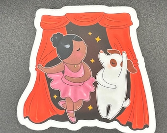 May include: A sticker featuring a ballerina and a dog on a stage with red curtains. The ballerina wears a pink tutu and the dog is white with brown ears. Gold stars are in the background.