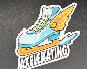 May include: A sticker featuring a light blue ice skate with gold laces and a gold wing. The skate is on a gold blade with the word "AXELERATING" in white block letters.