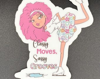 May include: A sticker featuring a cartoon figure skating. The skater has pink hair and is wearing a white top and a floral skirt. The text "Classy Moves, Sassy Grooves" is printed on the sticker.