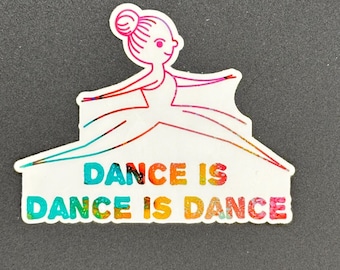 May include: A white sticker with a ballerina illustration and the text "DANCE IS DANCE IS DANCE" in rainbow colors. The ballerina is outlined in pink and red, with arms outstretched.