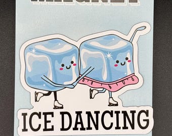 May include: A light blue magnet with the word "MAGNET" at the top. The magnet features an illustration of two smiling ice cubes ice skating and the words "ICE DANCING" at the bottom.