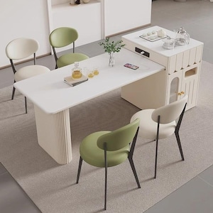 Isla de cocina convertible con mesa de comedor multifuncional y moderna que ahorra espacio.