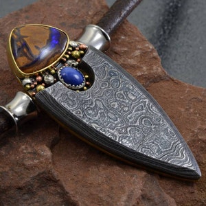 The Inner World Blue Sapphire and Boulder Opal Damascus Steel Pendant