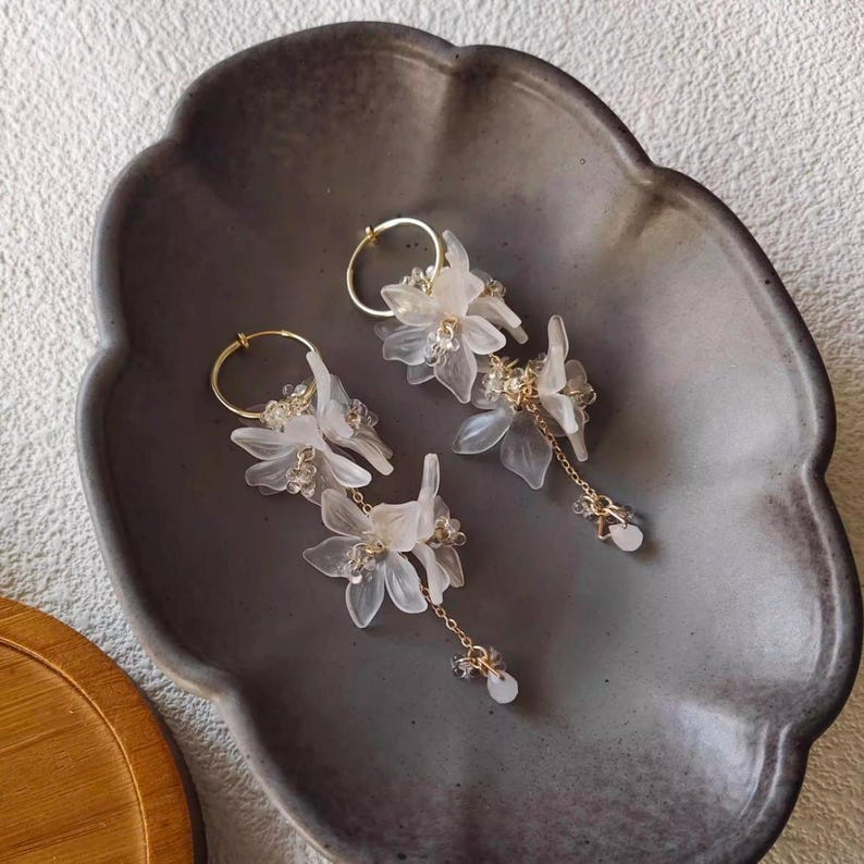 May include: A rustic wooden sign with the text "Welcome to our home" in white lettering. The sign features a distressed finish and a simple, inviting design, perfect for a front porch or entryway.