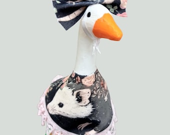Tema 7 de zarigüeya y mapache en atuendos de Desk Goose