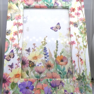 May include: A set of three ceramic mugs with a speckled, matte finish in cream, light grey, and dark grey. Each mug has a simple, minimalist design, suitable for coffee or tea.