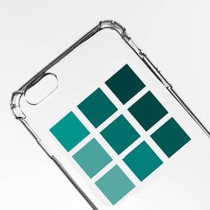 Peut inclure: Une coque de téléphone transparente et claire présentant une grille de neuf carrés disposés en un motif trois par trois. Les carrés affichent diverses nuances de bleu sarcelle et de vert foncé, créant un effet de dégradé au centre.