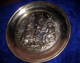 Brass repousse wall plate, Dutch scene, made in England