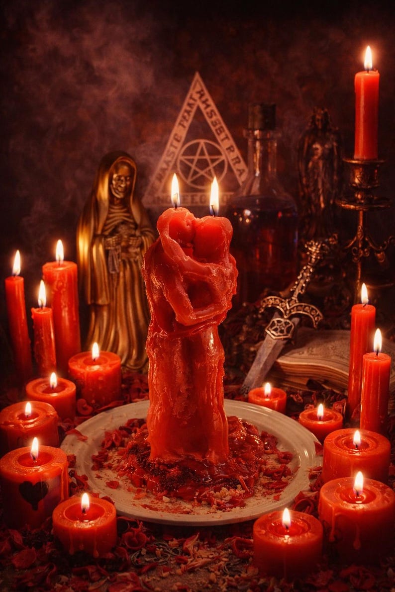 May include: A mystical scene featuring numerous red candles of varying sizes, some with heart-shaped cutouts. A central candle shaped like embracing figures is the focal point, surrounded by other occult items.