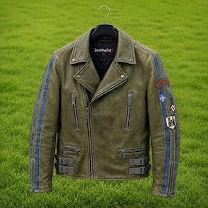 May include: Olive green leather jacket with blue stripes on the sleeves and multiple zipped pockets. The jacket features a notched collar, asymmetrical zip closure, and decorative patches on the right sleeve. The jacket is hanging on a black hanger.