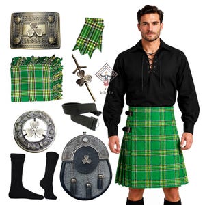Puede incluir: Una camisa negra de manga larga con cordones, una falda escocesa de cuadros verdes, un cinturón de cuero negro, calcetines negros, un sporran, una hebilla de metal, un juego de flashes, un broche para kilt y un broche circular con tréboles.