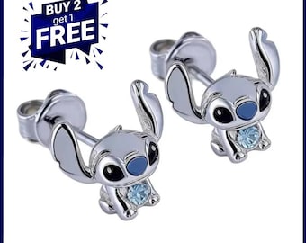 Oorbellen met stiksels en blauwe strass-steentjes