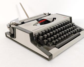 AEG Olympia Traveller de Luxe S Typewriter / Vintage Portable Typewriter / Writing Machine / Mid Century Office Decor / German keyboard