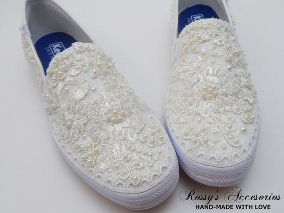 white lace slip on sneakers