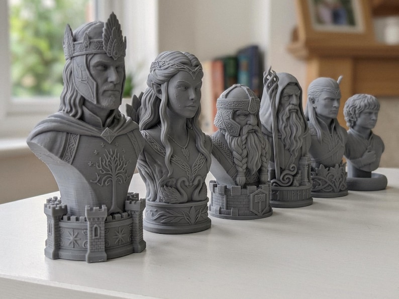 Middle-Earth Inspired Fantasy Bust Chess Set featuring six unique character-inspired chess pieces and three different chess board options. Detailed 3D printable STL files designed for FDM and resin 3D printing, ideal for fantasy collectors and chess enthusiasts.