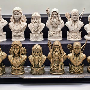 Middle-Earth Inspired Fantasy Bust Chess Set featuring six unique character-inspired chess pieces and three different chess board options. Detailed 3D printable STL files designed for FDM and resin 3D printing, ideal for fantasy collectors and chess enthusiasts.