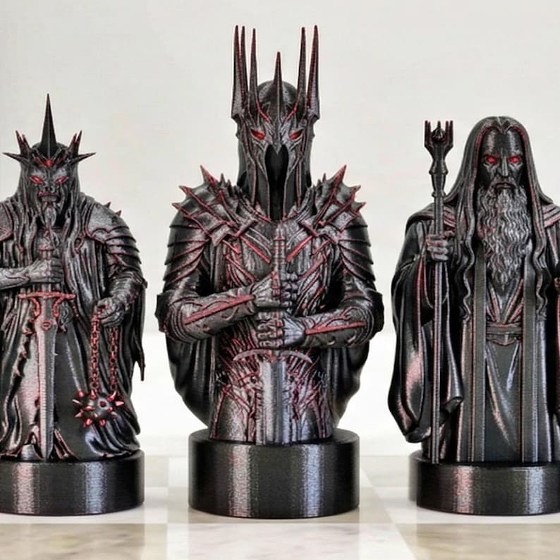A split-screen promotional banner for a Mythic Fantasy Chess Set STL collection. The top shows a row of finely crafted, white and gold character busts (Light faction: King, elves, dwarf). The bottom shows a row of dark, menacing, and intricate character busts (Dark faction: armored figures, ghouls). The center features a gothic-style title banner that reads: 'MYTHIC FANTASY CHESS SET STL'. The background shows a library and a dark fortress.