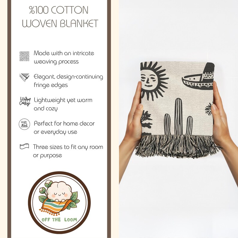 May include: A woven cotton blanket with a black and beige design featuring a sun, cactus, and sombrero. The blanket has fringe edges and is held by two hands. The blanket is made of 100% cotton.