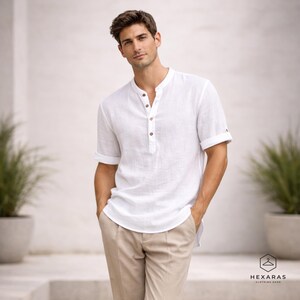 Mens white linen Henley shirt with short sleeves and relaxed fit for summer casual wear