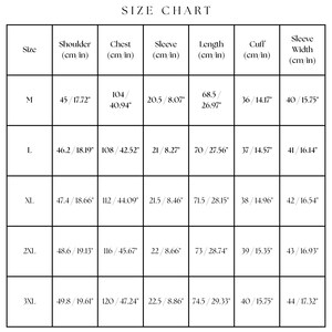 May include: A size chart with measurements in centimeters and inches. The chart includes sizes M, L, XL, 2XL, and 3XL, with corresponding shoulder, chest, sleeve, length, cuff, and sleeve width measurements. The text "SIZE CHART" is at the top.