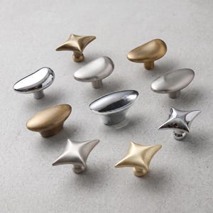 Tiradores modernos para armarios con forma de estrella y tiradores para cajones con forma de guijarro, herrajes de aleación de zinc para muebles, juego de pomos minimalistas para puertas de armarios de cocina.