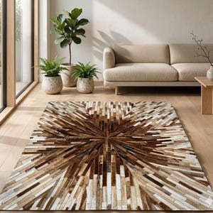 Rindsleder Patchwork Teppich | Starburst Sunburst Design | Natur Braun Tan Elfenbein | Handgefertigter Teppich aus Leder
