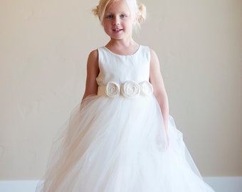 Handmade to Measure Flower girl dress and First Communion Dress in Ivory and White with a Tulle Skirt and Flowers on the Sash