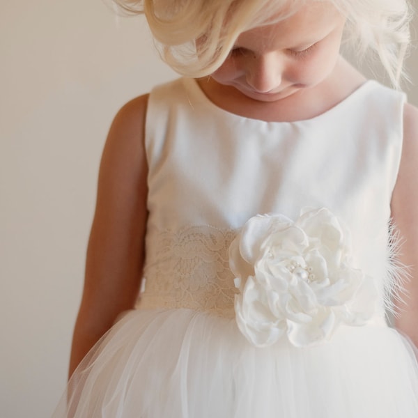 The Handmade to Measure Sorrel Flower Girl Dress in white and Ivory with a Full Tulle Skirt and Lace Sash