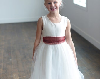 The Ruby organza flower girl dress, first communion dress, junior bridesmaid dress, with ruby red organza sash