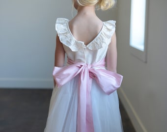 The Handmade Silk Ruffle Ballerina Flower Girl Dress in Ivory and White with a Silk Sash in a Wide Range of Colours