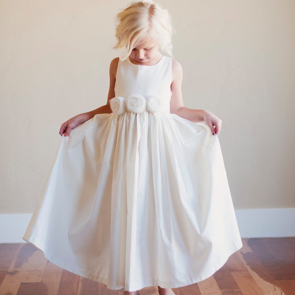 Handmade To Measure Cotton Flower Girl Dress in White and Ivory with Hand Rolled Roses on the Sash