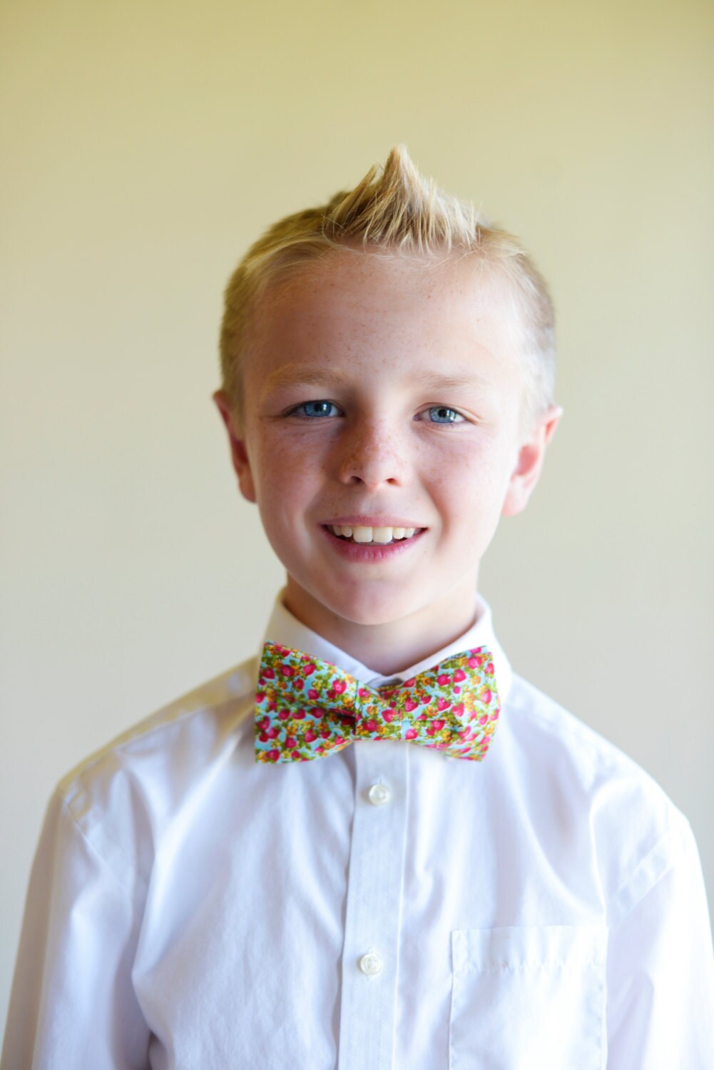 putting on a pre tied bow tie