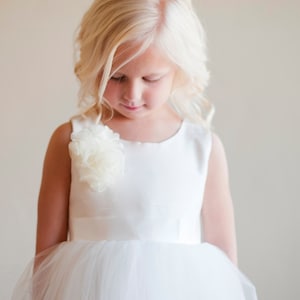 The Handmade to Measure Peony Silk Flower Girl Dress in Ivory and White with a Full Tulle Skirt