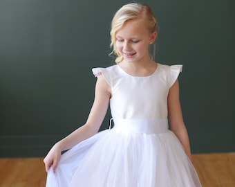 The Dovecote Handmade to Measure Silk Flower Girl Dress and First Communion Dress in Ivory and White with a Full Tulle Skirt