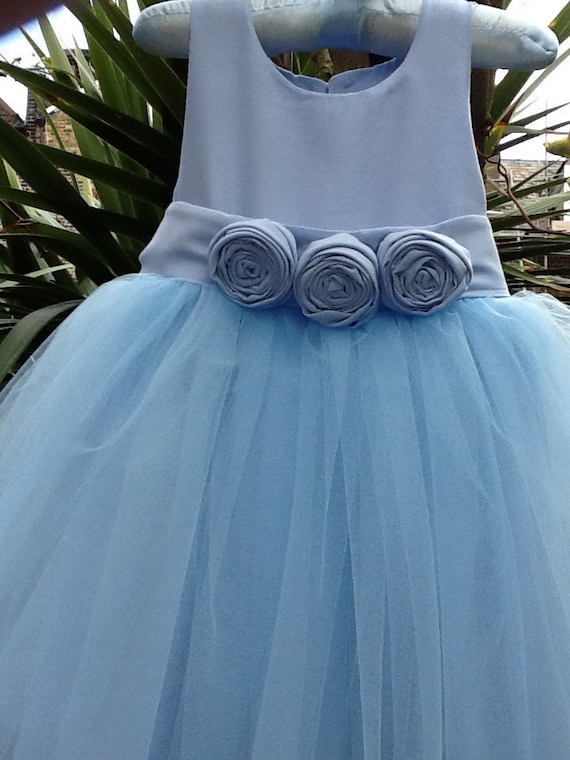 Items similar to Baby blue flower girl dress for wedding with rosettes